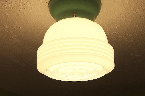 The vintage (many of them original) light fixtures add to the period charm.