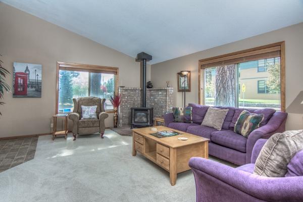 Wood burning stove in the family room serves as the home's gathering place.