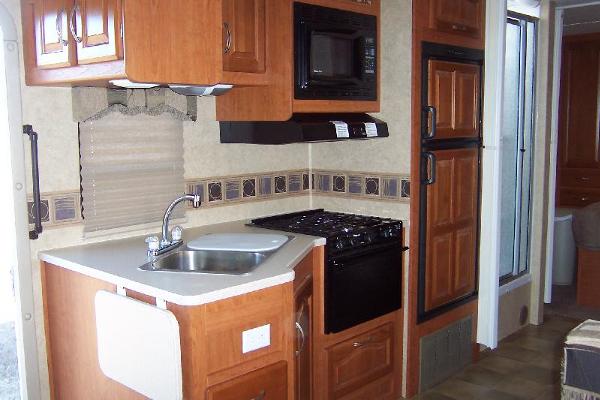 Full Kitchen with Fridge/Freezer, Oven/Stove Range, Micro and Double Sink