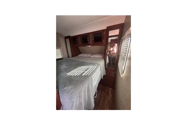 Master bedroom with queen bed