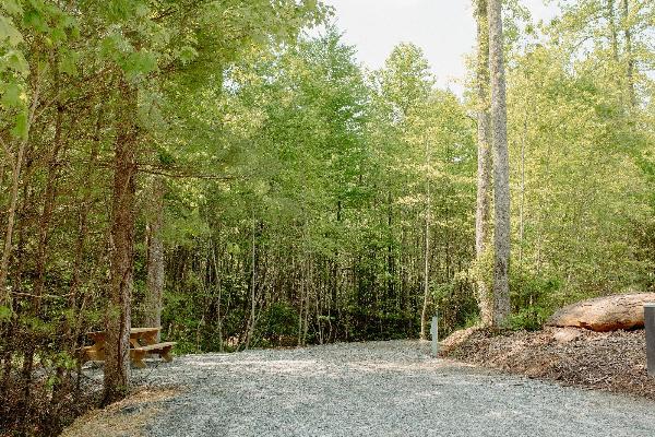 Site #190- Close to lower level of Bath house. 50'L 50/30 amp, FHU, table and fire ring w/ cooking grate. 