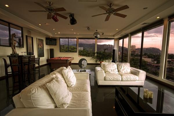 Breathtaking view from luxurious penthouse bar and pool table