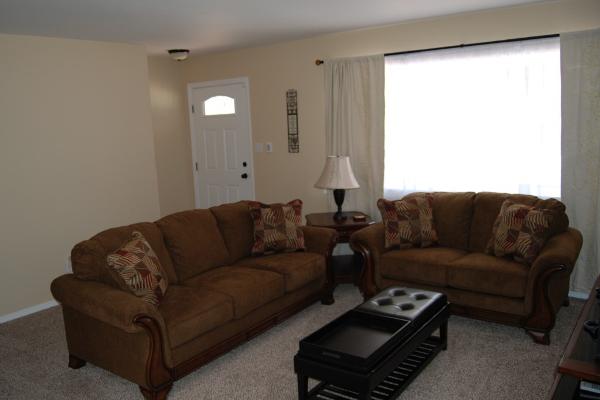 Modern living room with flatscreen tv, cable, dvd player, wireless internet, phone and security system