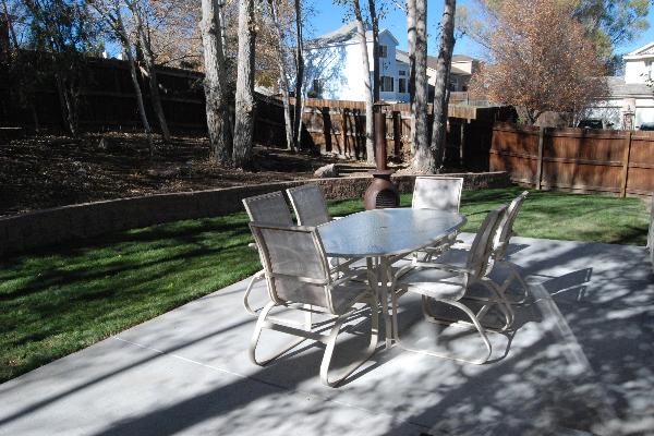 Shaded back yard and large patio