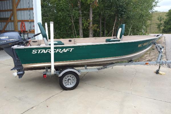 Fishing Boat: 14ft Starcraft w/15hp (pull start)